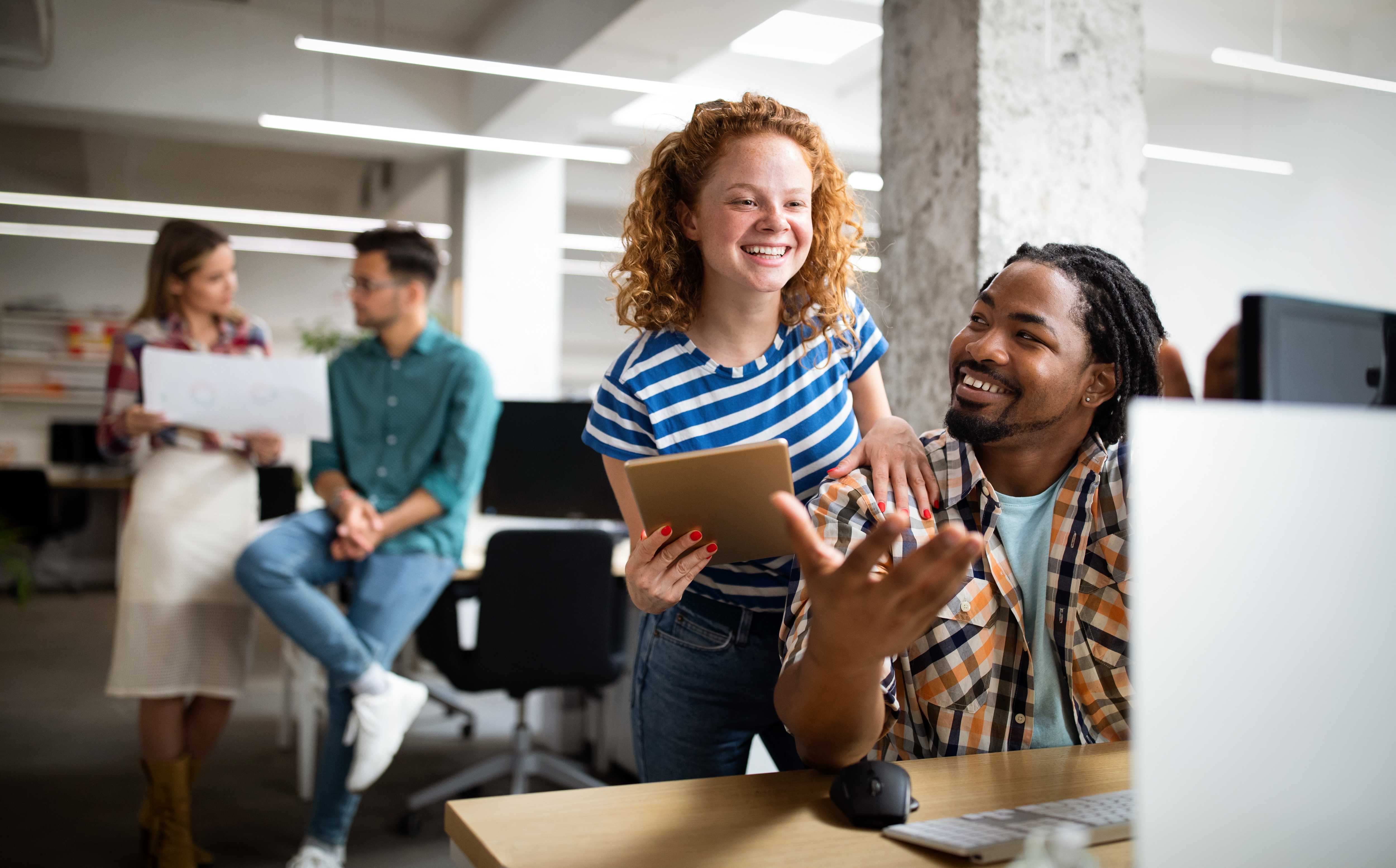 A diverse team collaborating in an office